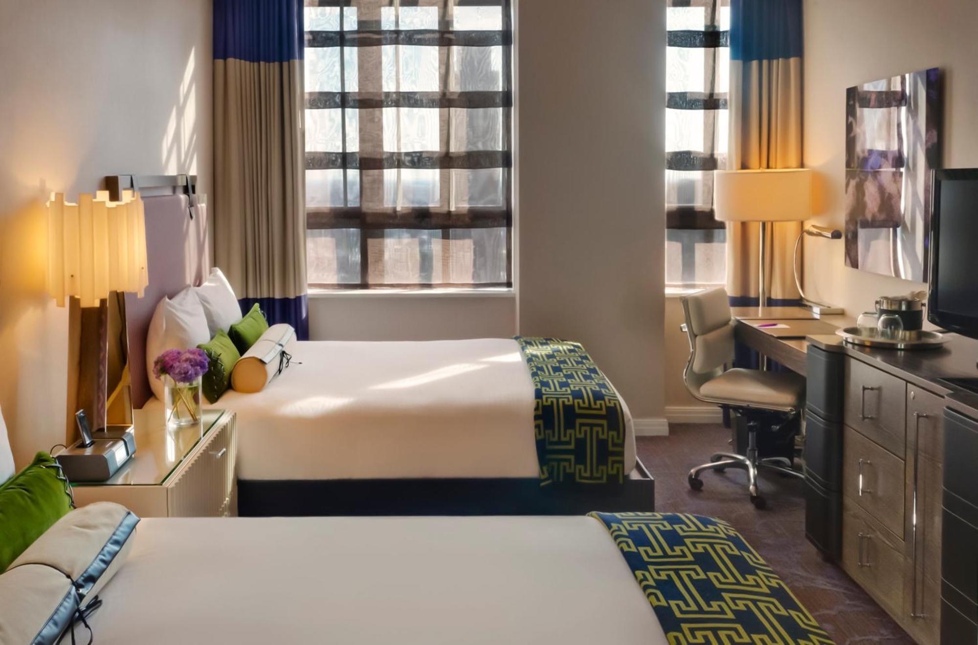 Essential Queen Room with Two Queen Beds and City View